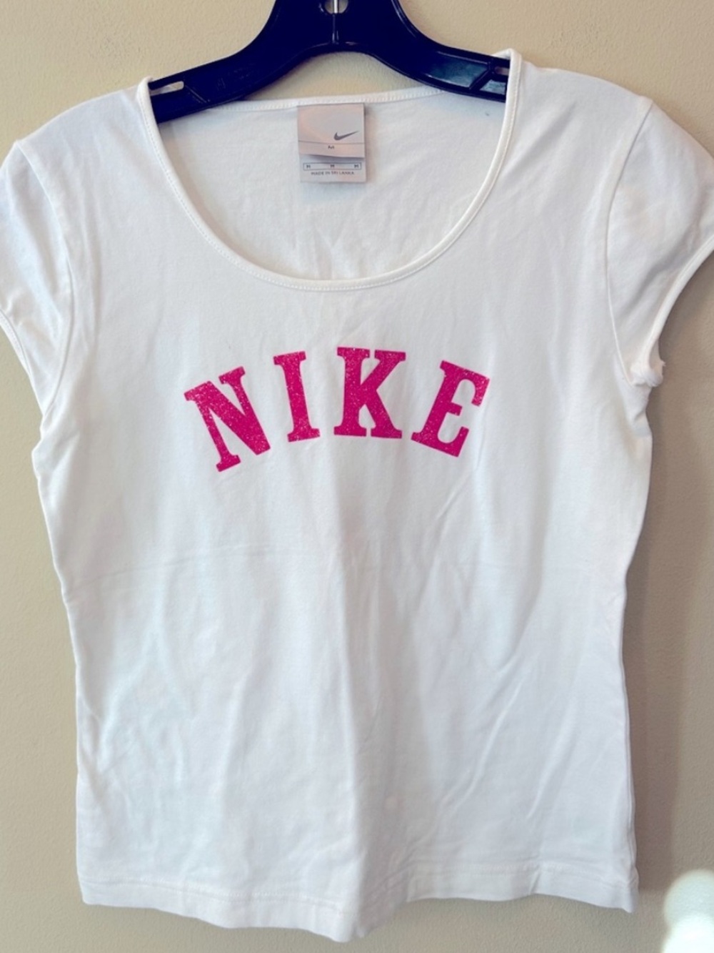 Nike pink and white graphic tee with sparkly lettering